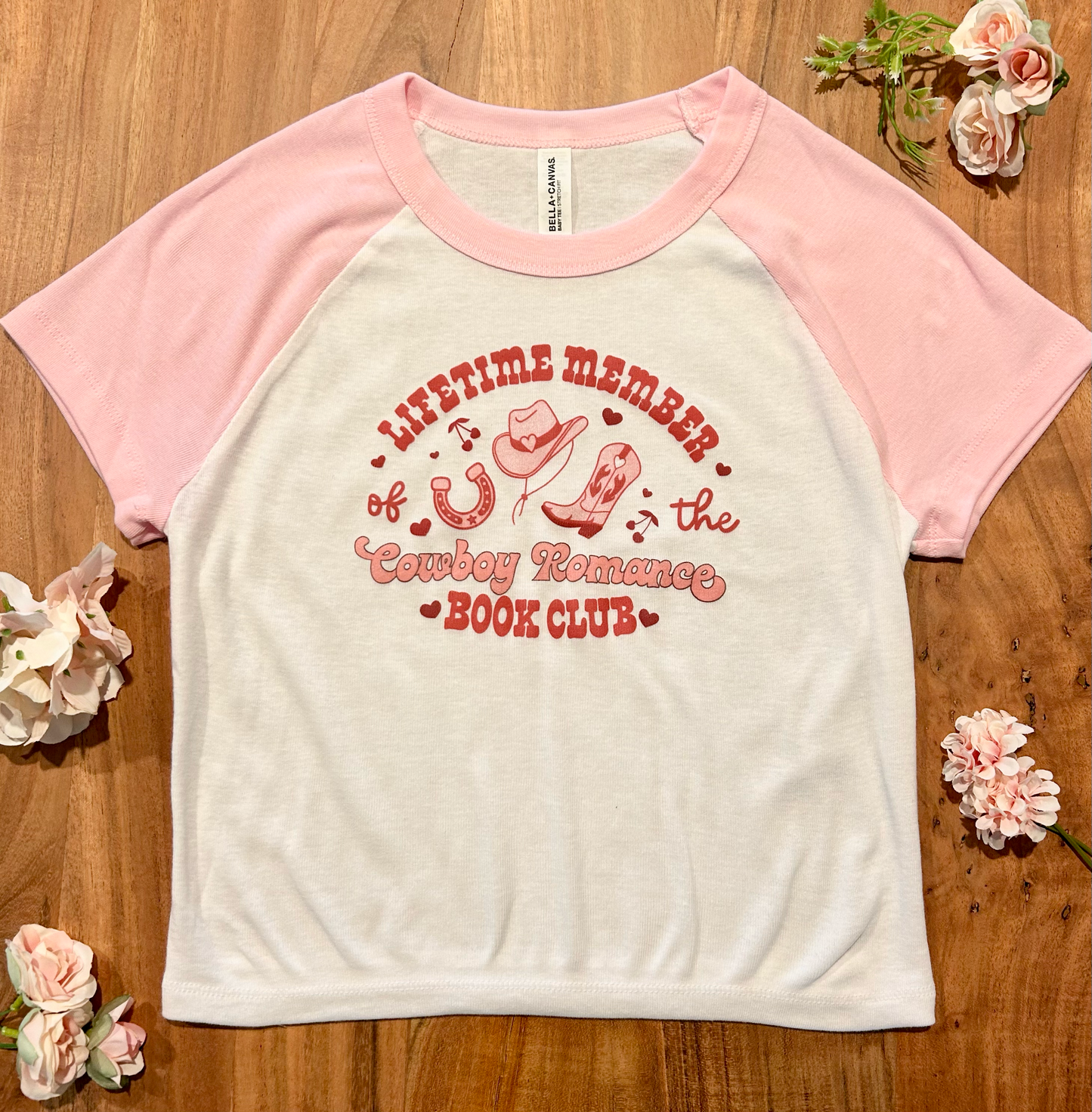 Cowboy romance book club pink and white baseball baby tee